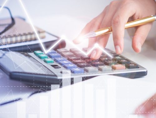 accountant-calculating-profit-with-financial-analysis-graphs